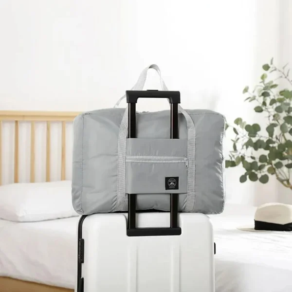 S07d6bcd2abc64b739ac5d0f221b5778dN.webp The Weekender Foldable Travel Duffel